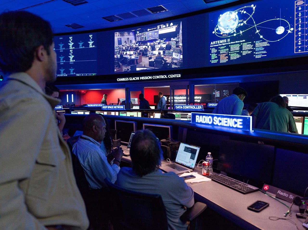 Staff at NASA’s Jet Propulsion Laboratory in Southern California watch the agency’s Artemis II mission unfold soon after launch on April 1, 2026, at the Space Flight Operations Facility, which operates the Deep Space Network (DSN).